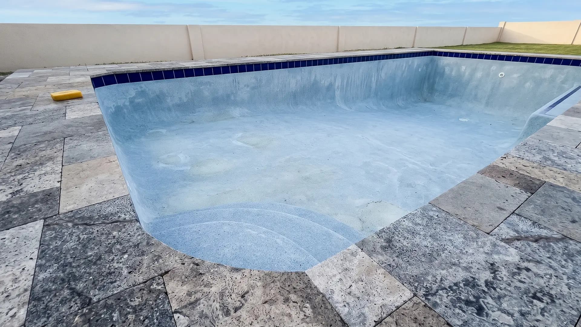 Travertine hardscape by TL Pavers