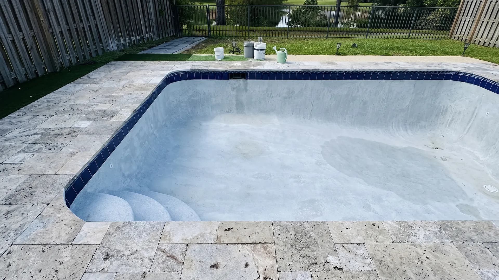 Pool renovation with new stone coping
