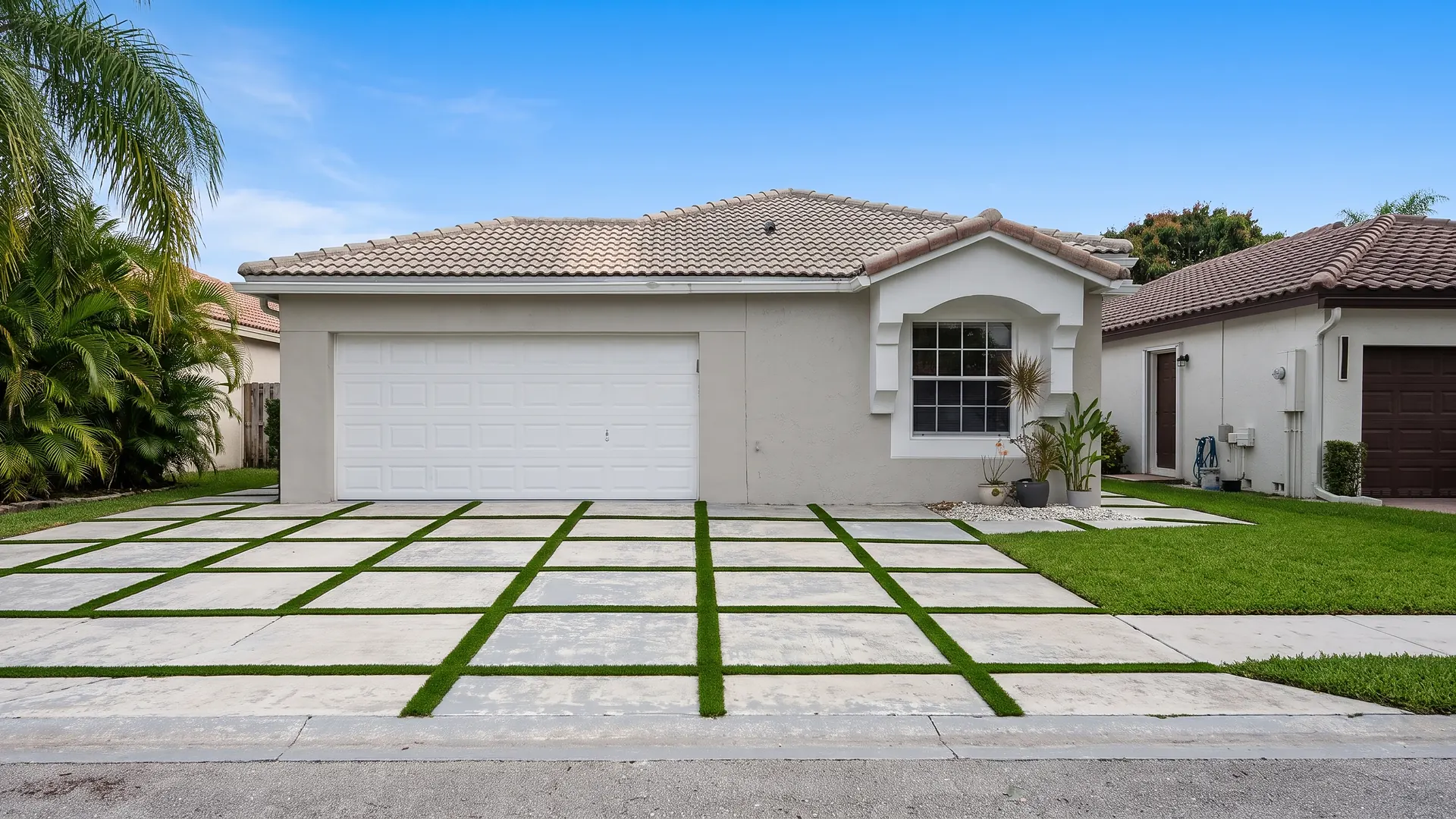 Slab driveway with turf joints