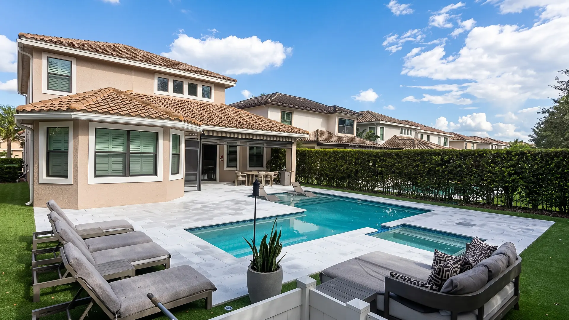 Stone pool deck and spa